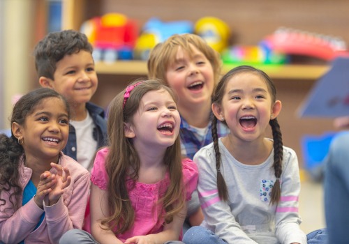 A group of smiling and laughing children at a Peoria IL Daycare