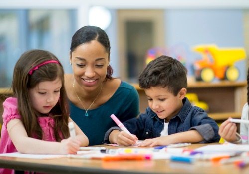 An instructor watching over her students in Nursery School in Peoria IL