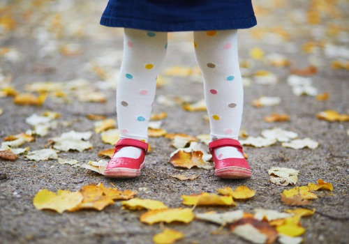 The legs of a little girl on her way to Daycares in Peoria IL