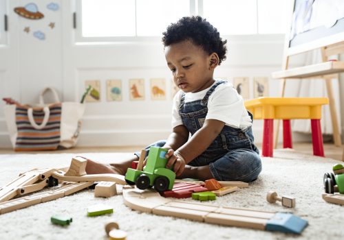 Baby Playing at a Facility for Infant Care for East Peoria IL