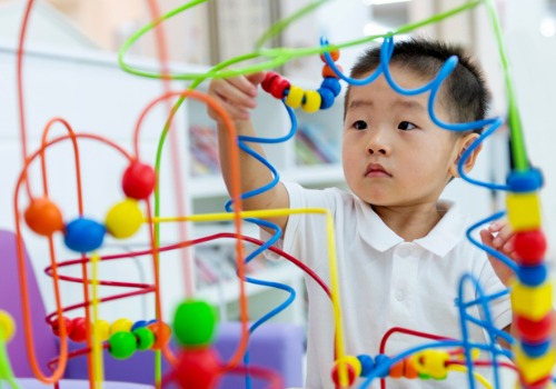 Boy Playing at Infant Care for Dunlap IL