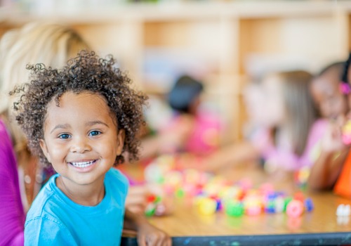 A child smiles at PALS, which is an outstanding option if you're looking for Child Care Near You