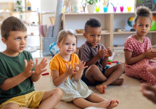 A group of kids sit in a circle at PALS, which offers Childcare Facilities in Peoria IL